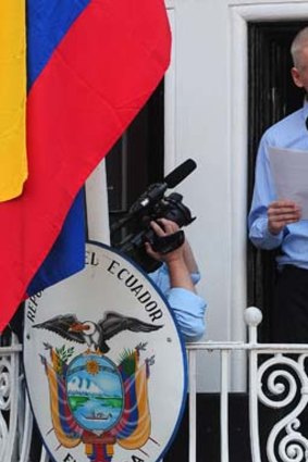 Julian Assange makes a statement from the balcony of the Ecuadorian Embassy in London.