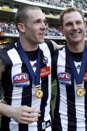 Medal men: Dane Swan with Johnson after the Pies' 2010 premiership.