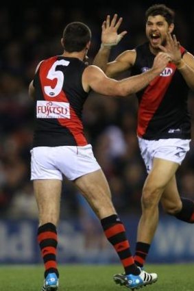 Paddy Ryder celebrates a  goal but  may face legal complications in quitting Essendon. 