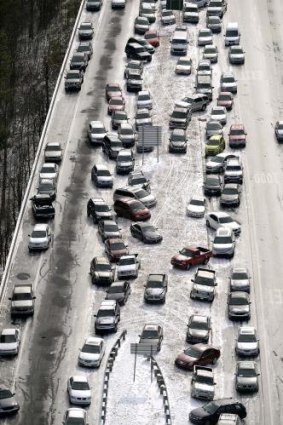 Cars stranded by an unexpected cold snap in America's South.