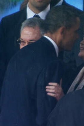 Differences set aside ... US President Barack Obama hugs Brazil's President Dilma Rousseff at the FNB Stadium in Soweto, South Africa.