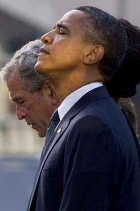 Reflecting ... Barack Obama and George W. Bush.