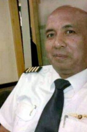 Did he try to turn the plane?  Zaharie Ahmad Shah, pilot of Malaysia Airlines flight MH370, seen in a photo posted to his community Facebook pages.