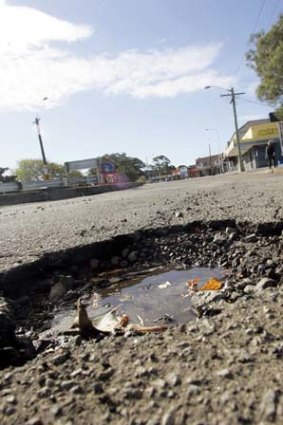 Pothole: Rain damaged roads.