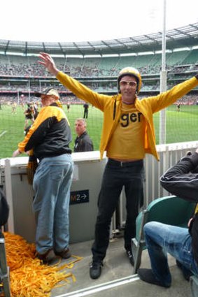 Richmond fan Dugald Jellie in his finery at the MCG.