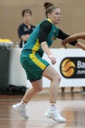 Natalie Hurst takes on Leilani Mitchell during an Australian Opals training camp at the AIS in January.