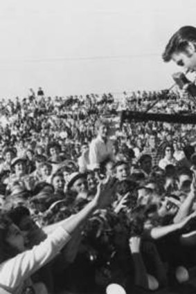 King's chorus: Elvis Presley - and his look - changed popular culture forever.