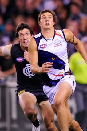 Adelaide says that the health of Kurt Tippett, seen here running for the ball ahead of Carlton's Michael Jamison, will be put ahead of the club's flag ambitions.