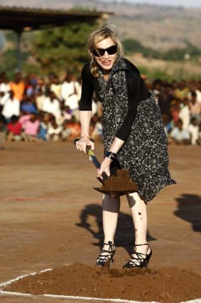 Madonna turns the soil in 2009.