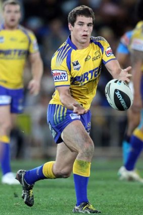 Daniel Mortimer of the Eels passes the ball during round 22 against the Titans.
