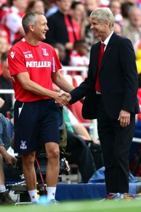Crystal Palace caretaker Keith Millen (left) with Arsenal manger Arsene Wenger.