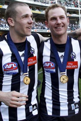 Dane Swan and Ben Johnson (right) celebrate after the 2010 grand final.