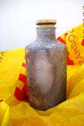 One of the chemical canisters which has washed up on a north Queensland beach.
