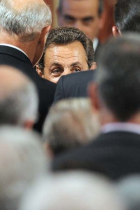 Struggling  ... Mr Sarkozy at the Elysee Palace yesterday.