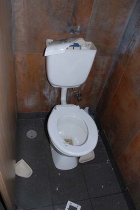 The damaged toilet at a McDonald's.