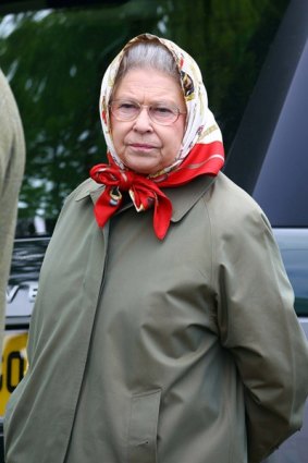Queen Elizabeth wears a Hermes scarf. 
