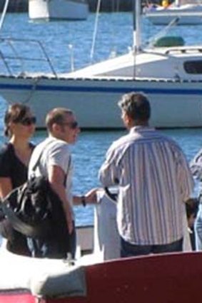At sea ... Moses Obeid, far right, at the Elizabeth Bay Marina, which the Obeid family part-owns. Mr Suleman paid $160,000 for a share in it.