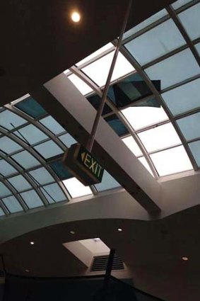 Glass panels torn from the roof of Hornsby Westfield by strong winds. Photo used with permission from dwina champion (@para_dwins) on Twitter.