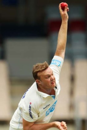 Doug Bollinger bowls on day one of match against Queensland on Wednesday.