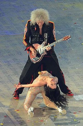 Rocking the stadium ... Queen guitarist Brian May, with Jessie J.