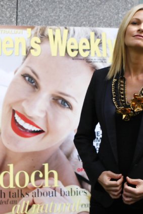 Sarah Murdoch with a picture of her on the front of the Women's Weekly.