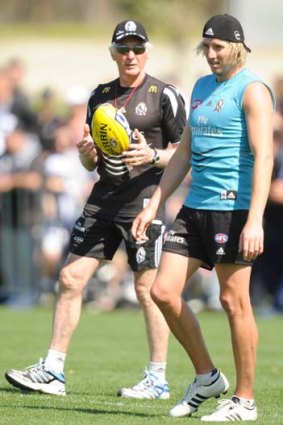 Mick Malthouse with Dale Thomas during his days as Collingwood coach.