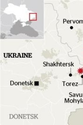Ukrainian and rebel forces are locked in a struggle for control of the MH17 crash site.