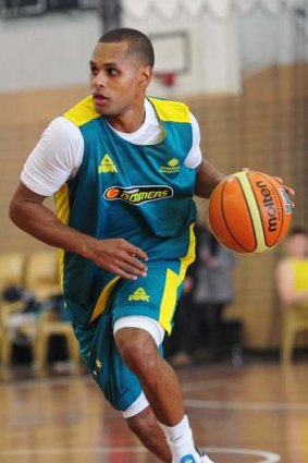 Patty Mills trains with the Boomers in Canberra last year.