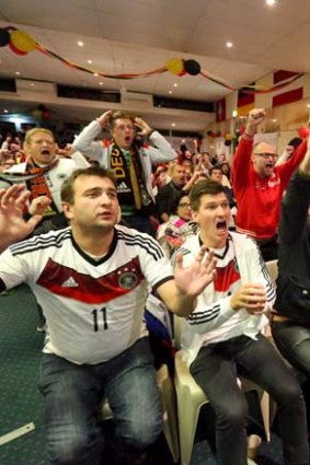 German fans watch the finals against Argentina at the Concordia Club in Sydney.