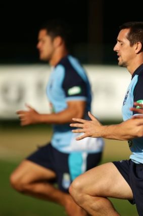 Mitchell Pearce (centre) goes through his paces with the Blues at Coogee Oval.