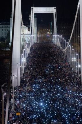 Block vote: Ten thousand participants marched across the Elisabeth bridge during a rally against the government's proposed tax on the internet.