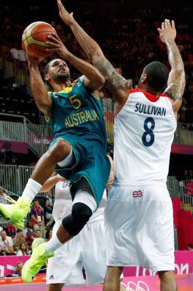 Australia's Patrick Mills shoots against Great Britain in Olympic basketball.