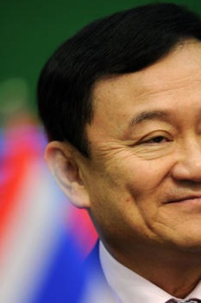 'We must strengthen democracy ... if democracy flourishes the military will have to stay in its camps,' Former Thai Prime Minister Thaksin Shinawatra.