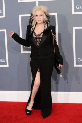 Cyndi Lauper arrives at the 2012 GRAMMY Awards.