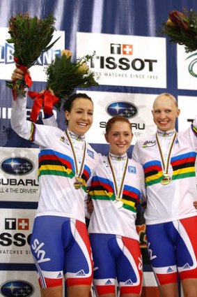 Danielle King, Laura Trott and Joanna Rowsell of Great Britain celebrate with their medals.