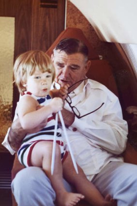 Come fly with me … John Hancock with his grandfather, Lang, on Lang’s jet in 1978.