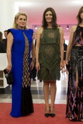 Catherine Deneuve, her daughter Chiara Mastroianni and compatriot Charlotte Gainsbourg on the red carpet at the 2014 Venice Film Festival.