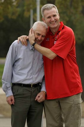 Hall in the family. A special moment for father and son Lindsay and Andrew Gaze as they announce their retirements together in May 2005.