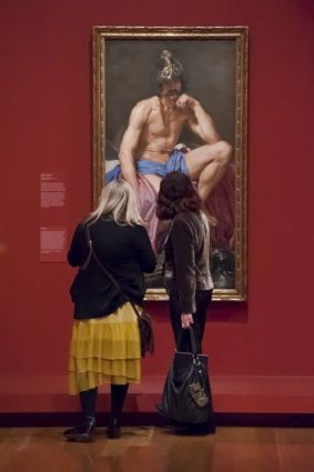 Patrons at the Queensland Art Gallery view <i>Mars</i> by Velazquez from the <i>Portrait of Spain: Masterpieces from the Prado</i>.