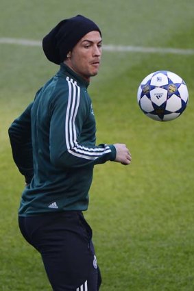 Cristiano Ronaldo controls a ball during a training session at the Etihad Stadium in Manchester on Monday.