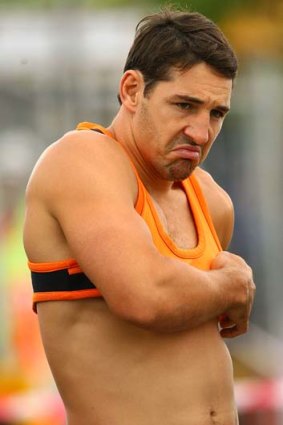 Cheer up Billy, the season starts tomorrow ... Melbourne Storm fullback Billy Slater cut a miserable figure at training yesterday. Maybe it's because someone made him wear that daft day-glo sports bra.