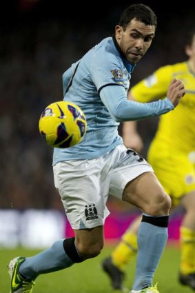 Is that a Lollygobbleblissbomb I see before me? Carlos Tevez has bulked up.