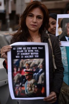 A supporter of former dictator Pervez Musharraf at a rally in Karachi on Saturday.