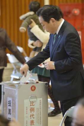 Not looking good ... the Japanese Prime Minister, Yoshihiko Noda, casts his ballot.