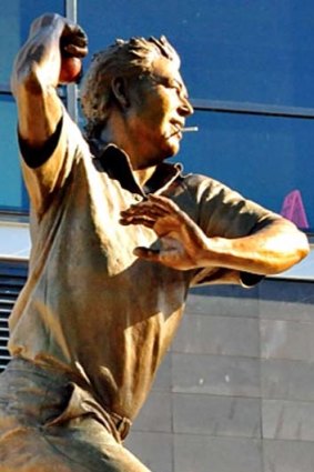 Shane Warne's statue with a cigarette stuck in his mouth.