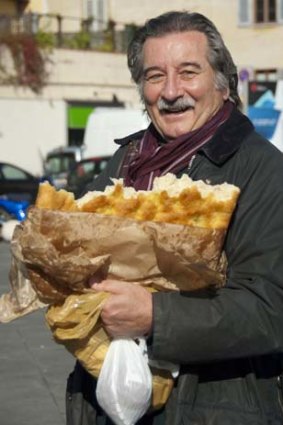 Chef Libero Saraceni with fresh bread.