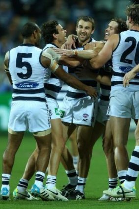 Corey Enright, seen here celebrating a goal against the Kangaroos in round 10, is expected to be fit to face Carlton.
