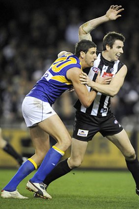 Battling it out: Dean Cox and Darren Jolly fight for the ball.