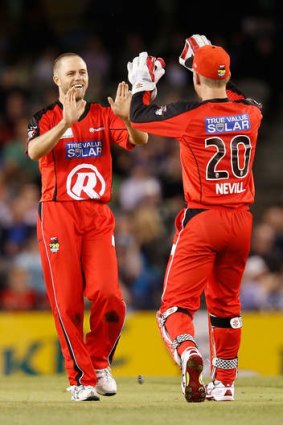 Sweet success: Nate Rimmington (left) and Peter Nevill celebrate a wicket for the Renegades.