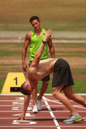 More is Moore: John Steffensen puts Kevin Moore through some training routines at Sydney Olympic Park this week.